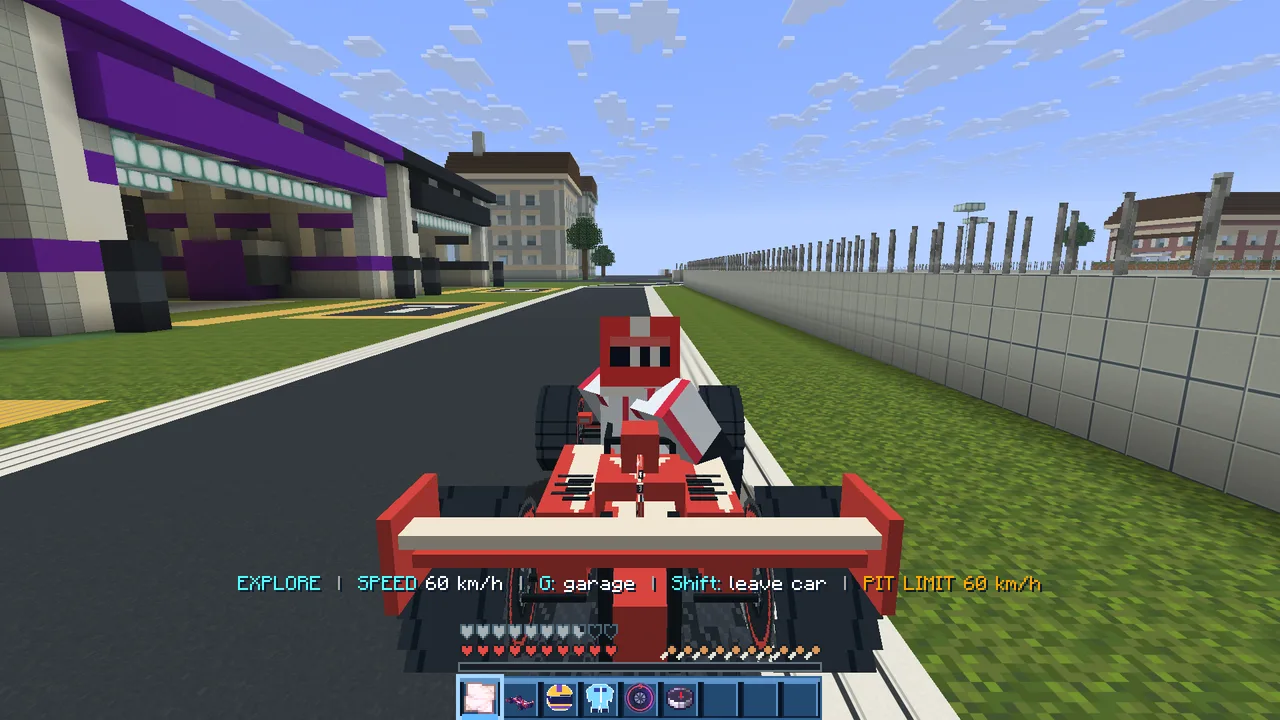 Real in-game screenshot, whole frame: the red car in the pit lane, PIT LIMIT 60 km/h on the HUD.